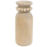 This decorative vase is made of gray-washed natural wood. It features a simple and round carved silhouette, as well as a string of round wooden beads encircling the top. Display this vase freestanding on any shelf or tabletop, filled with a single-stem faux floral or a small spray of greenery for a beautiful display.  Materials: Wood  Dimensions: 3" diameter x 7 1/2" high