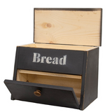 This bread box is an attractive, functional container with a black painted finish and distressed detailing. The box is simple, featuring stamped white lettering, reading “Bread," as well as a hinged top that lifts and a knobbed-door opening on the front. This box makes a great addition to a kitchen countertop.
It is proudly made in the USA.
Materials:
Wood, metal
Dimensions:
16 1/2" wide x 10" deep x 12" high