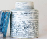 Whether used to store actual ginger or to show off fresh flowers, this jar is perfect for your kitchen. It is made of stoneware and has a blue striped design. Because this jar is handmade, each one will vary slightly. This is a wonderful option for a wedding gift. JaBella Designs, Shopify
