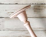 If you’re looking for shabby cottage chic dining table decorations or shelf decor, look no further! These hand-painted, wood candle holders complement almost any home or dining room decor. And they are a great choice for a farmhouse chic wedding reception. Place several of these candlesticks in a group for centerpiece or on a mantel in a living room for a vintage-inspired candlescape.
These candle holders are painted in light pink and accented with a hand-rubbed java brown antiquing glaze to bring out thei