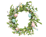 Easter egg wreath
This Easter-themed wreath features a green paper-wrapped base and branches. It is accented by pink, blue, and yellow foam eggs, berries, and plastic seeds. It looks amazing on a covered door or hung above a couch. The wreath branches can be fanned and fluffed for a fuller look if desired.
Materials:
Foam, plastic
Dimensions:
15" diameter overall 