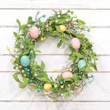 Easter egg wreath
This Easter-themed wreath features a green paper-wrapped base and branches. It is accented by pink, blue, and yellow foam eggs, berries, and plastic seeds. It looks amazing on a covered door or hung above a couch. The wreath branches can be fanned and fluffed for a fuller look if desired.
Materials:
Foam, plastic
Dimensions:
15" diameter overall 