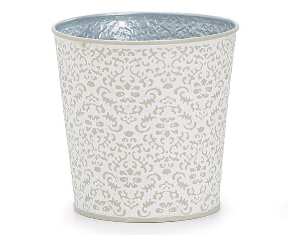 This adorable pot cover feature a hand-painted gray and white embossed design. It is the perfect size for a small counter or window sill. Place potted herbs in groupings of three for a wonderful, yet useful, decorative display in your kitchen. <br><br>Materials:<br>Metal, PVC liner<br><br>Dimensions:<br>4 1/2