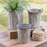 Whether used to store potting shed knick knacks or to display your favorite potted herbs, these pails are perfect for your country garden. Your purchase includes all three pails.  Materials: Metal  Dimensions: Smallest pail - 8 1/2" wide x 7" deep x 9" high 