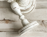 Sold individually, these candle holders are painted in layers of soft white and coffee brown before being distressed to bring out their rustic style. They are then accented with a hand-rubbed java brown antiquing glaze and distressed. They are finished with a matte wax sealer for durability, JaBella Designs