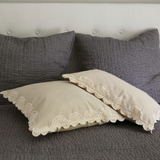 Lumbar pillow in natural 
Exceptional handcrafted details and vintage styling make this pillow worthy of the coveted blue ribbon. Our pillow features hand-crocheted artistry in texture-rich cotton, subtly colored in a natural light beige to mix with your homes decor. This is a great piece for a guest room bed.
Materials:
Cotton, down alternative fill
Dimensions:
12" high x 20" long
Care:
Machine wash cold on gentle cycle