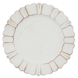 Ivory distressed plate chargers  Bring your table decor to the next level with these gorgeous plate chargers. Featuring a light, ivory finish, and shaped with an antiqued scalloped trim, the round charger plates add a graceful note. Pair with elegant dinnerware and linen table napkins for a timeless display.  These chargers, which are not food safe, are sold individually or in lots of four.  Materials: Plastic  Dimensions: 13" in diameter overall