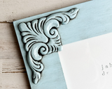 Hand-painted light blue ornate picture frame