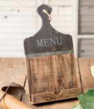 Use this item to display tonight's supper! It features the word "Menu" on the top of the holder atop a darker brown background. It sits on a table using an easel back. This tablet stand would make for a great gift.
Materials:
Wood
Dimensions:
8 3/4" wide x 2" deep x 16" high