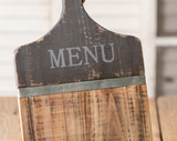 Use this item to display tonight's supper! It features the word "Menu" on the top of the holder atop a darker brown background. It sits on a table using an easel back. This tablet stand would make for a great gift.
Materials:
Wood
Dimensions:
8 3/4" wide x 2" deep x 16" high