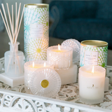 'Prosecco' holiday candle 
Featuring hints of white nectarine, crisp champagne, and cassis, this gorgeous hand-poured candle is perfect for year-round use. It comes in a shimmery glass jar with matching lid. The container is beautiful and can easily be repurposed when the time comes. This candle, which is vegan and cruelty free, is a great option for a housewarming gift.
This item is proudly made in the USA.
Materials:
Glass
Ingredients:
American-sourced soy blend, cotton wick, and luxury fragrance