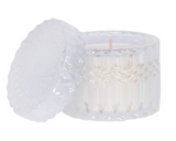 'Prosecco' holiday candle 
Featuring hints of white nectarine, crisp champagne, and cassis, this gorgeous hand-poured candle is perfect for year-round use. It comes in a shimmery glass jar with matching lid. The container is beautiful and can easily be repurposed when the time comes. This candle, which is vegan and cruelty free, is a great option for a housewarming gift.
This item is proudly made in the USA.
Materials:
Glass
Ingredients:
American-sourced soy blend, cotton wick, and luxury fragrance