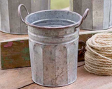 Whether used to store potting shed knick knacks or to display your favorite potted herbs, these pails are perfect for your country garden. Your purchase includes all three pails.  Materials: Metal  Dimensions: Smallest pail - 8 1/2" wide x 7" deep x 9" high 