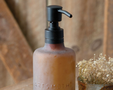 Brown apothecary soap dispenser
Our apothecary soap dispenser has a rustic design and can be filled with any liquid soap. The glass is frosted and has ''artsmoth tonic'' written on the front. Add this soap dispenser to a spa gift set for a wonderful collection.
Materials:
Glass, plastic, metal
Dimensions:
3" diameter x 9 1/2" high