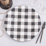Black & white buffalo check plate charger  Give your dinner table a stylish presentation update with this charger plate set in a timeless and classic buffalo plaid design. It adds the perfect country accent for the year-round use or holiday entertaining. Combine it with a solid runner or tablecloth and dinnerware to add the perfect contrast.   These chargers are sold individually or in lots of four.  Materials: Plastic  Dimensions: 14" in diameter overall  Care: Hand-wash only 