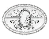 Black white porcelain toile serving platter
A study in detail, this sophisticated white and black serving platter mixes modern femininity, high fashion, and enchanting illustrative floral designs with a hint of naiveté.