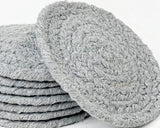 Gray braided cotton round coaster set
These coastal-inspired coasters are as practical as they are stylish. Not only will these coasters add warmth to your bars and table tops, they will also protect those surfaces from the heat of hot cups or the water from a cool beverage. You can even use them on desks to help protect your devices from splashes of coffee, energy drinks or even some water.
Materials:
100% Cotton
Dimensions:
4" diameter
