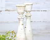 Distressed antique white & brown candlesticks