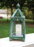 Distressed green chicken wire candle lantern