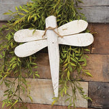 Add whimsical charm to your lake house with this decorative hanging cutout. Made in the USA of chunky natural wood, this dragonfly has a distressed white painted finish, as well as a jute tie at the top. This piece is wonderful for spring and summer, and it can be displayed hanging on a wall or door using the jute hanger attached at the back. JaBella Designs