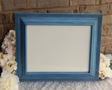 large blue wooden picture frame