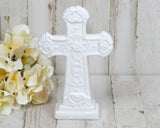 Ornate white free-standing cross figurine
Add an inspirational piece to your cottage style shelf decor with this white ceramic cross that features ornate detailing along the front and back. The cross is situated on a smooth base, so that it may be displayed on its own or used as an accent piece on a shelf.
Materials:
Porcelain ceramic
Dimensions:
5 1/4” wide x 8 1/2” tall
1 3/4” deep at base