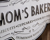 Metal ‘Mom’s Bakery’ kitchen wall sign