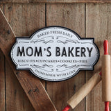 Metal ‘Mom’s Bakery’ kitchen wall sign