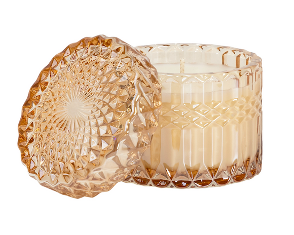 'Amber' soy candle 

Featuring hints of tangelo citrus softened by star flower and the golden glow of white amber, this gorgeous hand-poured candle is perfect for year-round use. It provides the perfect balance of brightness and sensual depth. This scent feels like a slow dance in golden hour light. It comes in a shimmery glass jar with matching lid. The container is beautiful and can easily be repurposed when the time comes. 