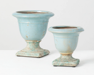 Terracotta, clay, and even concrete have unique properties of being sustainable, safe, durable and versatile enough for every style! No matter your personal style, there is one key factor to nailing this trend for your home design: Find the beauty in the not-so-perfect. These pots do just that. Each pot features a distressed aqua blue finish for a vintage-inspired look. They do not come with drain holes. These would look great on a coffee table or entryway table.&nbsp;