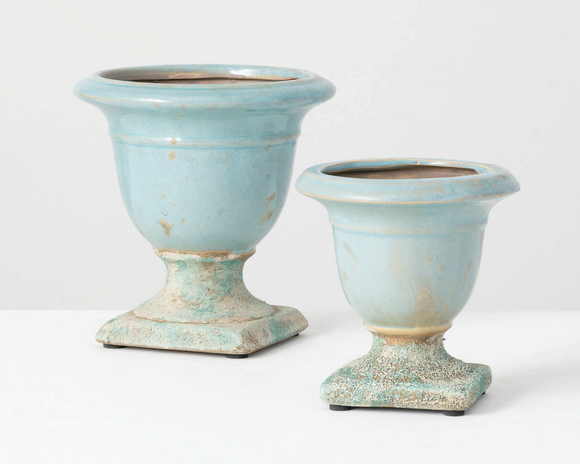 Terracotta, clay, and even concrete have unique properties of being sustainable, safe, durable and versatile enough for every style! No matter your personal style, there is one key factor to nailing this trend for your home design: Find the beauty in the not-so-perfect. These pots do just that. Each pot features a distressed aqua blue finish for a vintage-inspired look. They do not come with drain holes. These would look great on a coffee table or entryway table. 