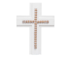 White cross with wooden beads on a white background