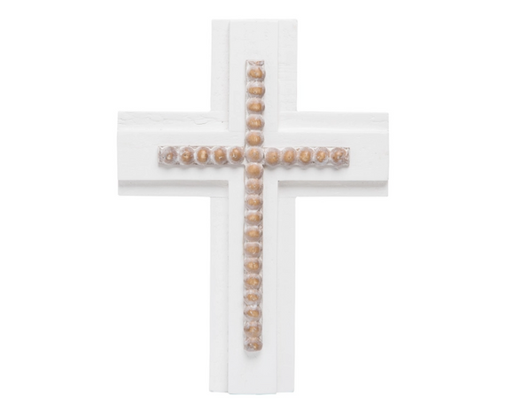 White cross with wooden beads on a white background