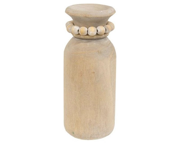This decorative vase is made of gray-washed natural wood. It features a simple and round carved silhouette, as well as a string of round wooden beads encircling the top. Display this vase freestanding on any shelf or tabletop, filled with a single-stem faux floral or a small spray of greenery for a beautiful display.  Materials: Wood  Dimensions: 3