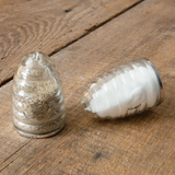 Honey hive salt &amp; pepper shaker set

The honey hive salt and pepper shakers will be a perfect addition to your kitchenware. They are made of glass and feature "S" and "P" on the front. Please wash salt and pepper shakers before use.

Materials:
Glass

Dimensions:
2" diameter x 3" high