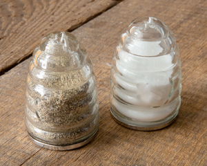 Honey hive salt &amp; pepper shaker set

The honey hive salt and pepper shakers will be a perfect addition to your kitchenware. They are made of glass and feature "S" and "P" on the front. Please wash salt and pepper shakers before use.

Materials:
Glass

Dimensions:
2" diameter x 3" high