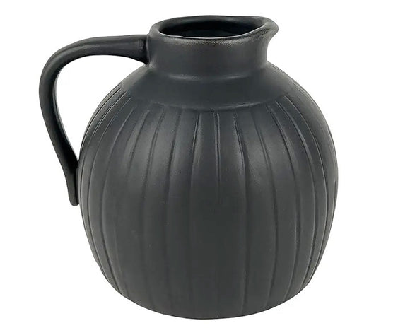 Add this trendy accent to your home with this set of contemporary black vases that highlight elegant simplicity. It features a matte black finish, ribbed accents, and a handle. 

Materials:
Ceramic

Dimensions:
4 1/2