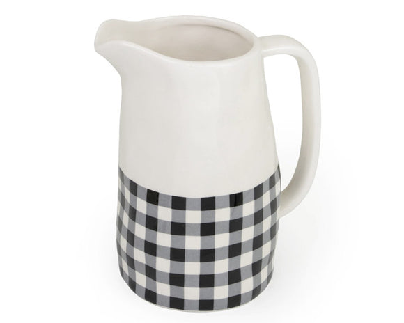 Serve up your favorite drink with this adorable pitcher. It features a black and white buffalo check design with a white handle. This pitcher is also a great choice for an affordable, yet nice, gift.  Materials: Dolomite ceramic  Dimensions: 4 13/16
