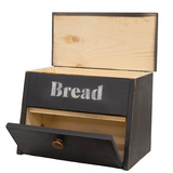 This bread box is an attractive, functional container with a black painted finish and distressed detailing. The box is simple, featuring stamped white lettering, reading “Bread," as well as a hinged top that lifts and a knobbed-door opening on the front. This box makes a great addition to a kitchen countertop.

It is proudly made in the USA.

Materials:
Wood, metal

Dimensions:
16 1/2" wide x 10" deep x 12" high
