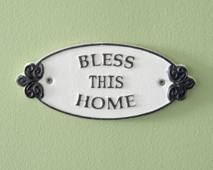 Welcome blessings into a home with this precious sign. It is crafted from cast iron and finished in black and white. To hang, use its two screw-hole hangers.

Materials:
Iron

Dimensions:
3" high x 1/4" deep x 7" wide