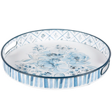 Blue white floral serving tray

This metal tray displays charming blue florals with a chinoiserie-inspired pattern along the sides of the tray. The designs are replicated from original art hand painted in a unique watercolor style. It includes dual metal handles for easy carrying. This is a vintage floral-themed home accent perfect for everyday use.

Materials:
Metal

Dimensions:
2" high x 12 1/2" diameter

Care:
Hand-wash only&nbsp;