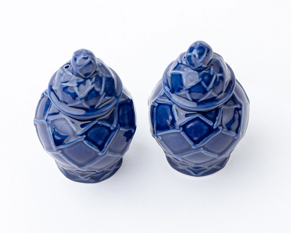 Two blue ceramic vases with geometric patterns on a white background
