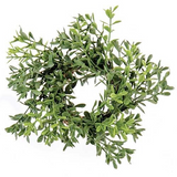 Artificial green wreath on a white background