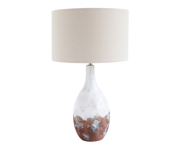 This cream color lamp with a rust and copper reactive glaze is reminiscent of a handmade vase. The light beige shades allow this lamp to fit in a wide range of room decors. <br><br>Materials:<br>Ceramic, linen, metal<br><br>Dimensions:<br>16