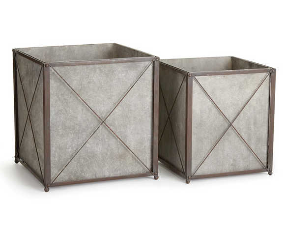 Two metal planters with geometric design cachepot planters on a white background