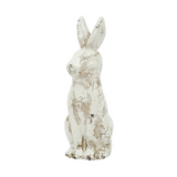 Vintage style cream ceramic rabbit figurine with a distressed finish on a white background.