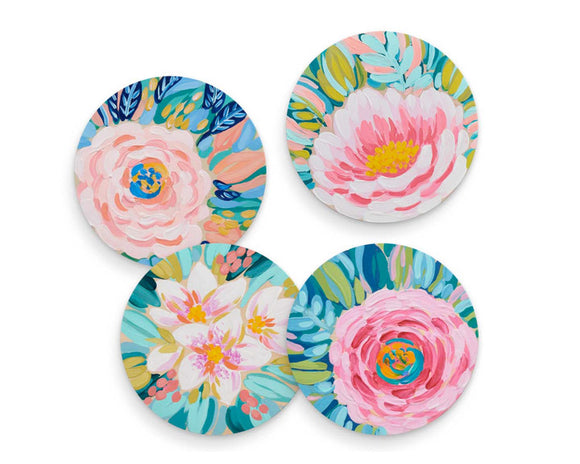 Set of 4 colorful floral coasters

A garden party would not be complete without designer Julie Marriott's painted pink flowers holding your beverage! Each coaster features a colorful floral picture. Each one is made of ceramic with a matte sandstone surface finish. The bottom of the coaster is covered in cork to protect your furniture.

Your purchase includes one coaster of each design. 

These coasters are proudly made in the USA.

Materials:
Ceramic

Dimensions:
4