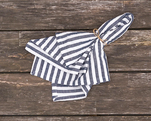 Dark blue striped seersucker cloth napkin

Add a playful pop of color to summer gatherings with this cotton woven napkin. It features a simple stripe alternating white and color. These napkins are perfect for casual tabletop decor, but they also pair well with existing table linens. Enjoy barbecues and backyard shindigs to the fullest with this summertime essential.

Materials:
Cotton

Dimensions:
20" wide x 20" long

Care:
Machine washable