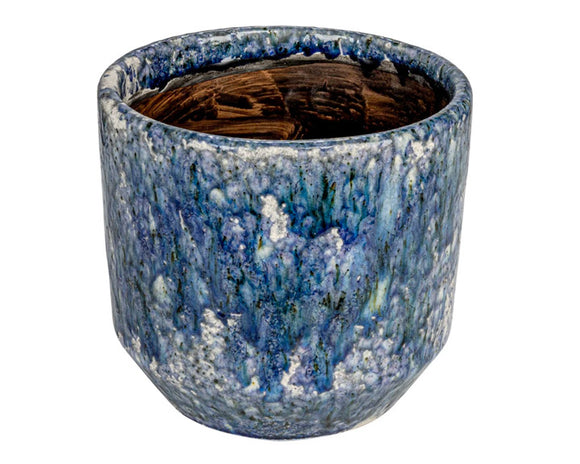 Add some charm and elegance to the space with this Terra-cotta pot cover. This beautiful planter is made of high-quality Terra-cotta that has a crackle glaze finish that creates a stunning effect. Each finish is unique and will vary slightly in color. The blue color adds a touch of freshness and vibrancy to the planter. It has a round shape that can hold a 6-inch inch pot. Use it to display plants or flowers indoors or outdoors. It will make your space stand out and impress your guests. 