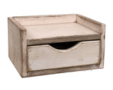 This country style drawer is a decorative storage box crafted from wood with rustic design. Featuring a heavily distressed finish, the light wood box is painted white with visible wood grain. The box features a sliding drawer with a top cutout for easy handling. This box is perfect for the kitchen or for use in a craft room.

This item is proudly made in the USA.
